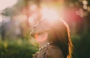 Person experiencing calm and emotional relief while practicing mindfulness, symbolizing how therapy helps with anxiety.